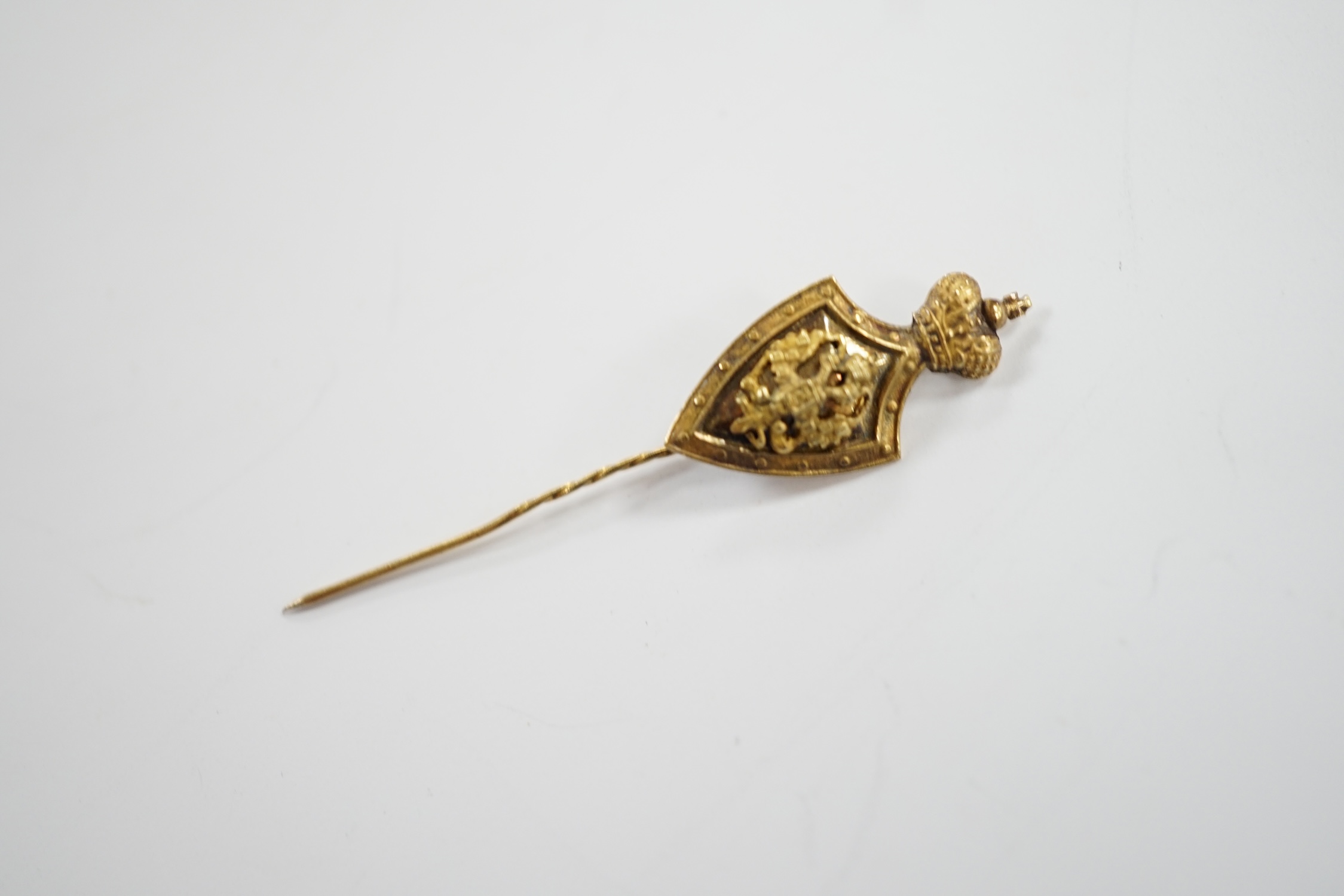 A Russian yellow metal (tests as 14k) Imperial Philanthropic Society for the Vocational Education of Poor Children stick pin, 48mm, 0.7 grams.